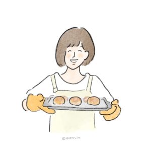 色鉛筆で描いたパンを焼く笑顔の女性のイラスト